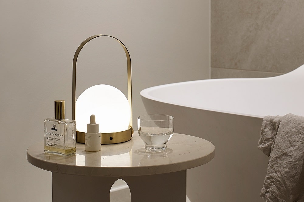 Menu Gold Carrie Portable Table LED Lamp Designed by Norm Architects