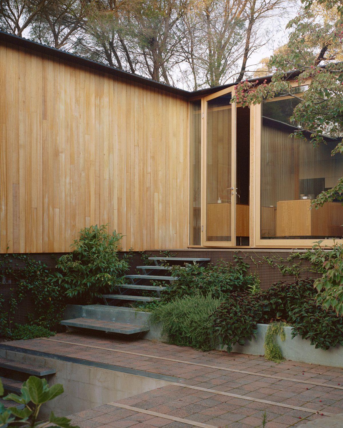 Timber House with Internal Courtyard by Archier & Openwork
