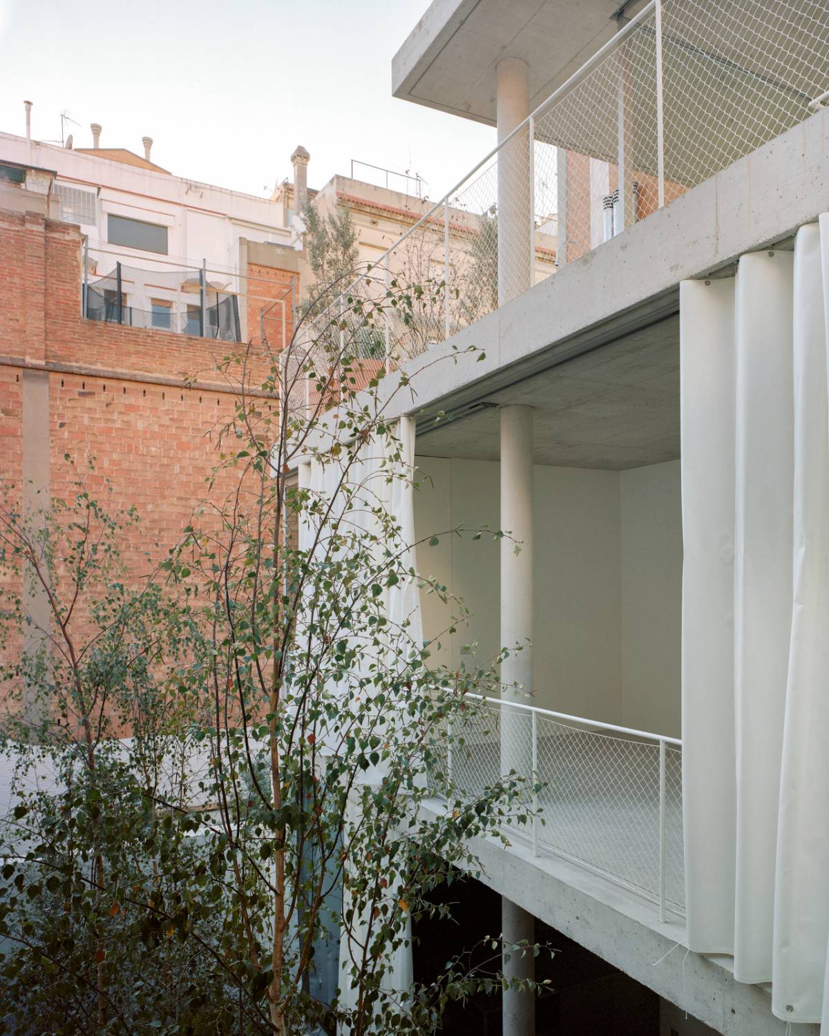 Concrete House with Patio Garden in Barcelona by Arquitectura-G