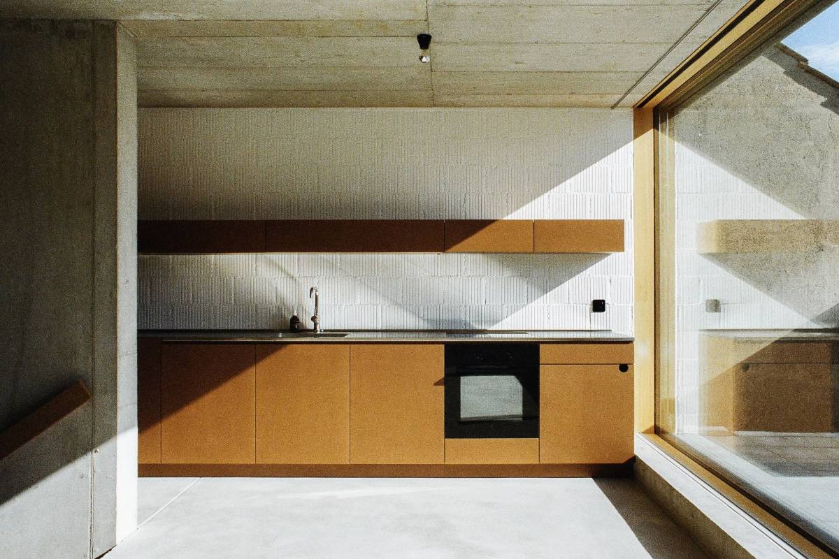 Raw Minimalist House in Basel designed by Estrada Reichen Architekten